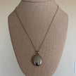 Silver Floral Oval Locket Necklace